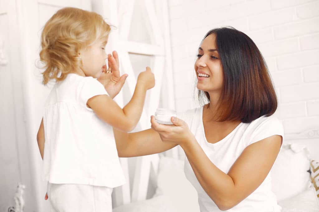 mother little daughter having fun home